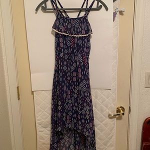 purple/pattern. ruffle, cross straps. child dress